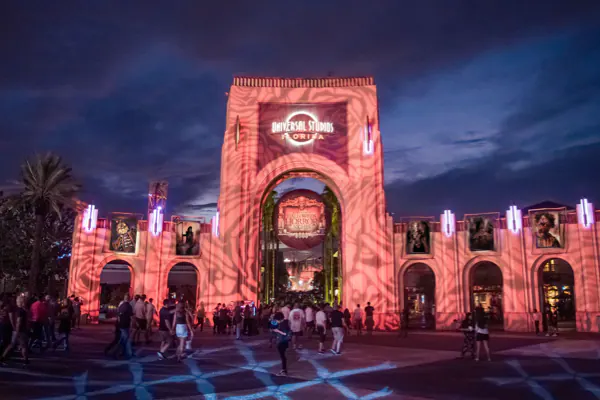 With an ominous purple night sky in the background, the Universal Studios Florida arch is lit up with swirling patterns for Halloween Horror Nights.