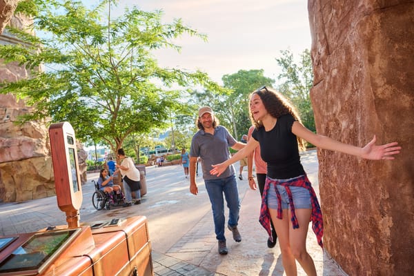 Guests walking through using effortless entry via photo validation.