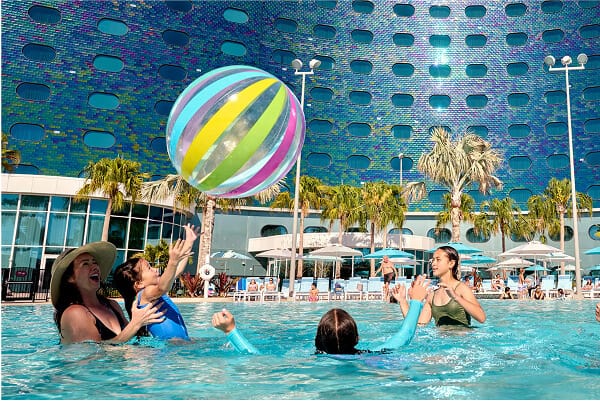 Terra Luna family in pool with beach ball