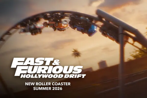 Inverted roller coaster with “Fast & Furious: Hollywood Drift—New Roller Coaster, Summer 2026” text.