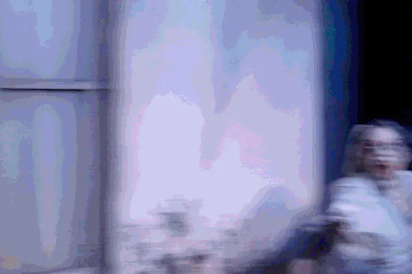 Rotating GIF of scareactors chasing and frightening Guests during Halloween Horror Nights at Universal Studios Hollywood.