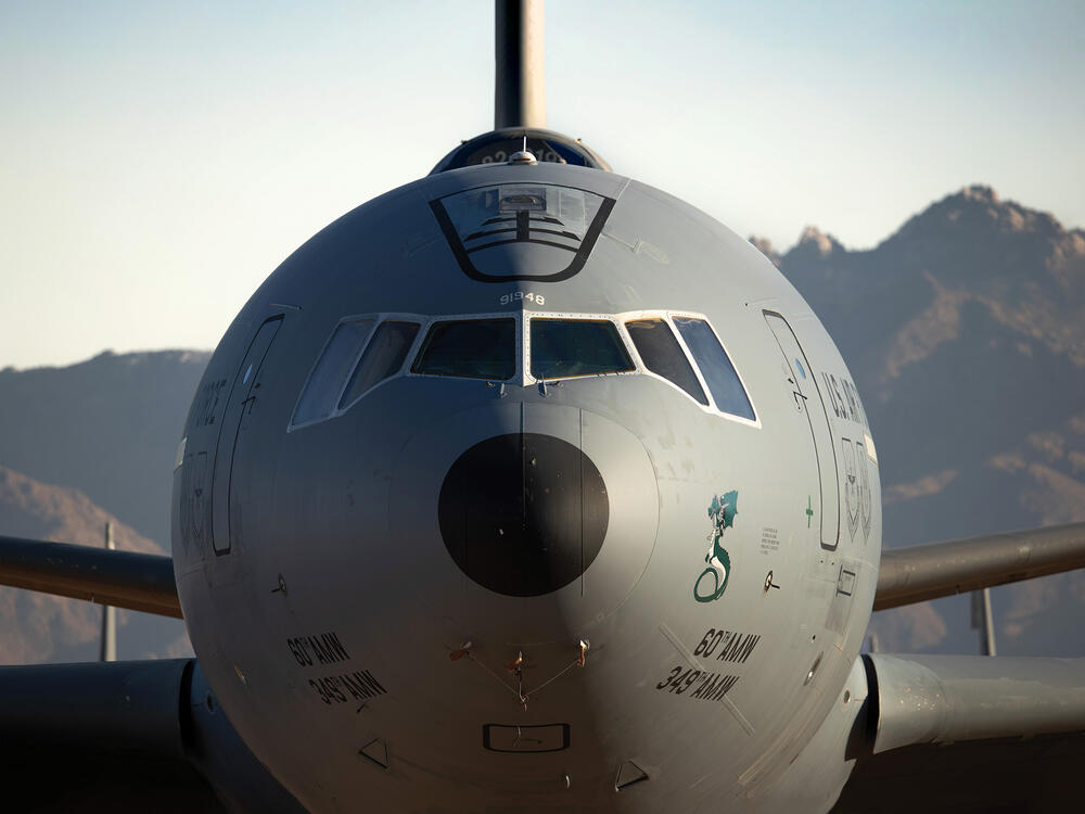 The nose of a large aircraft takes up the entire frame.