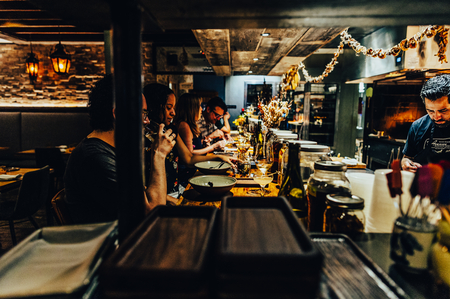 Diners at a MICHELIN-starred restaurant in Austin, Texas