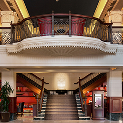 The elegant lobby, grand staircase and balcony in The Stephen F. Austin Royal Sonesta Hotel in Austin