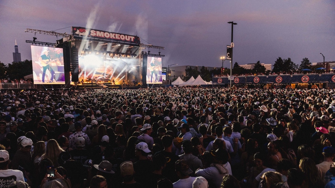A crowd watches a concert at Windy City Smokeout