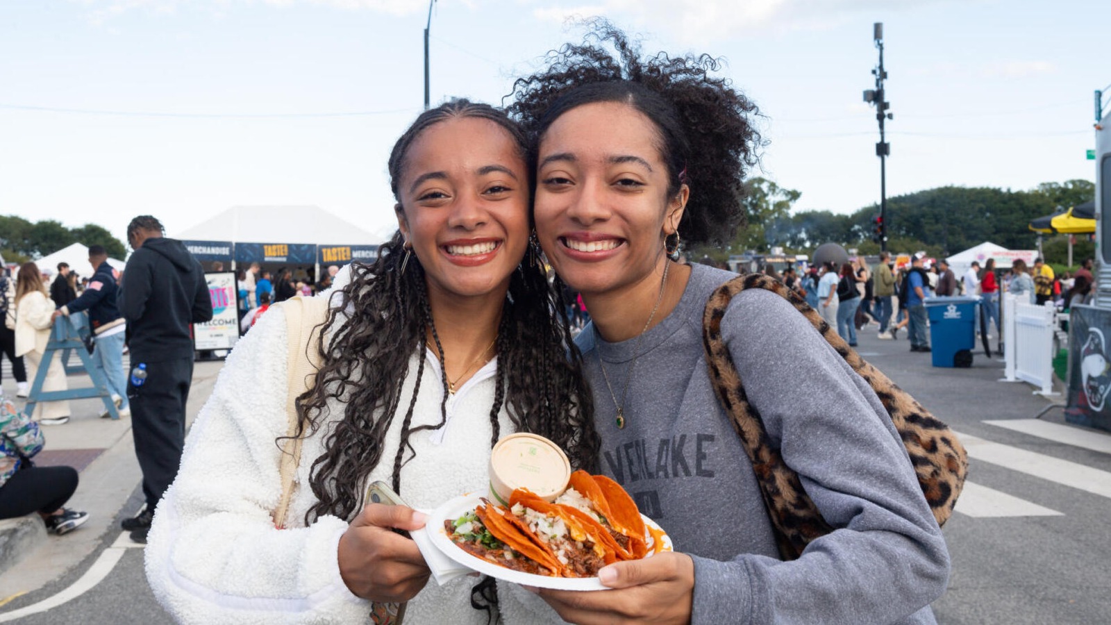 A couple shares a bite at a previous Taste of Chicago
