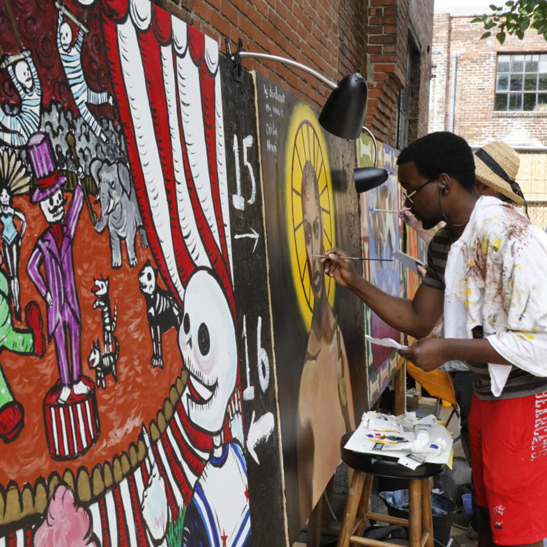 Image of artists painting.