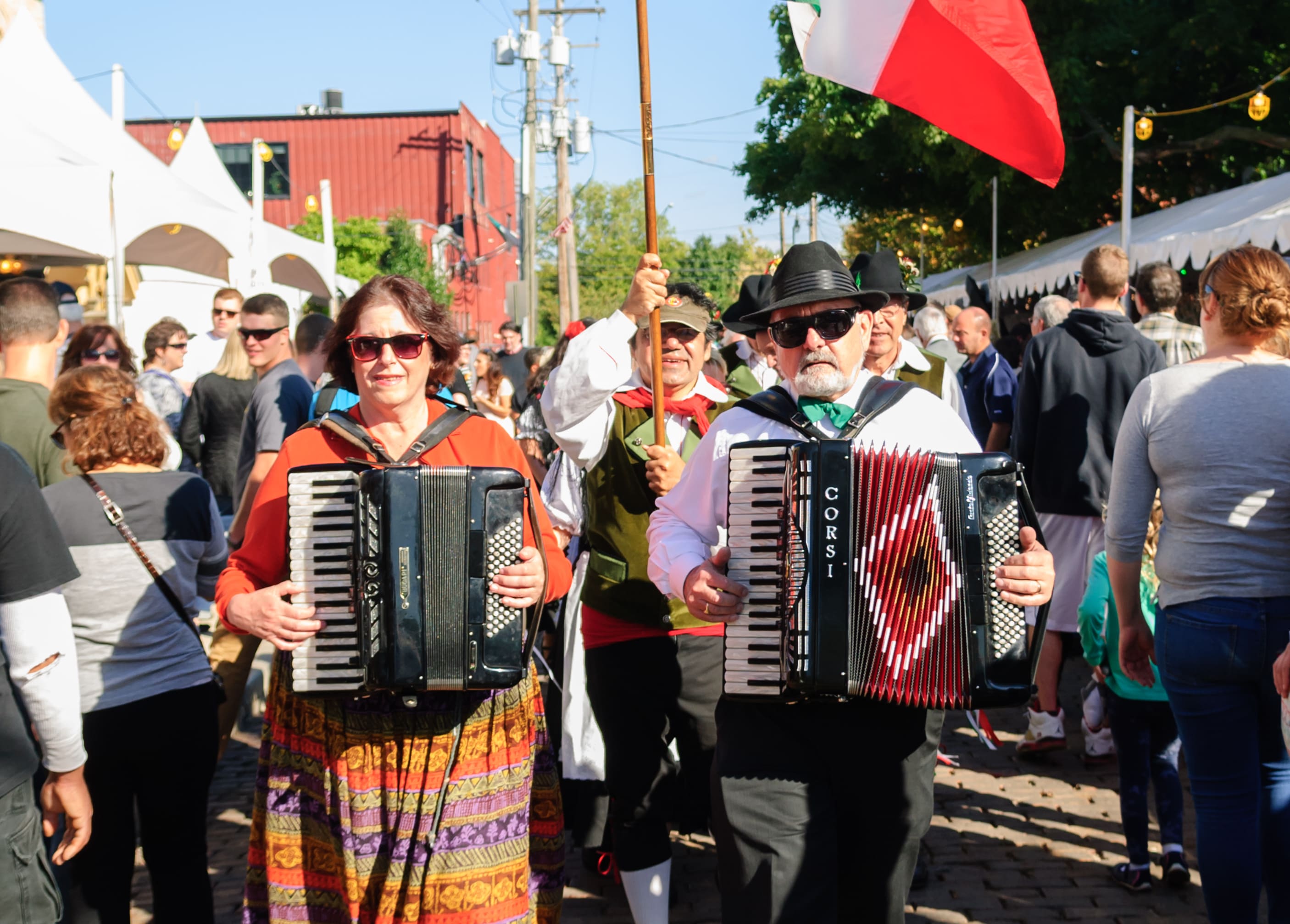 Man and woman playing accordions