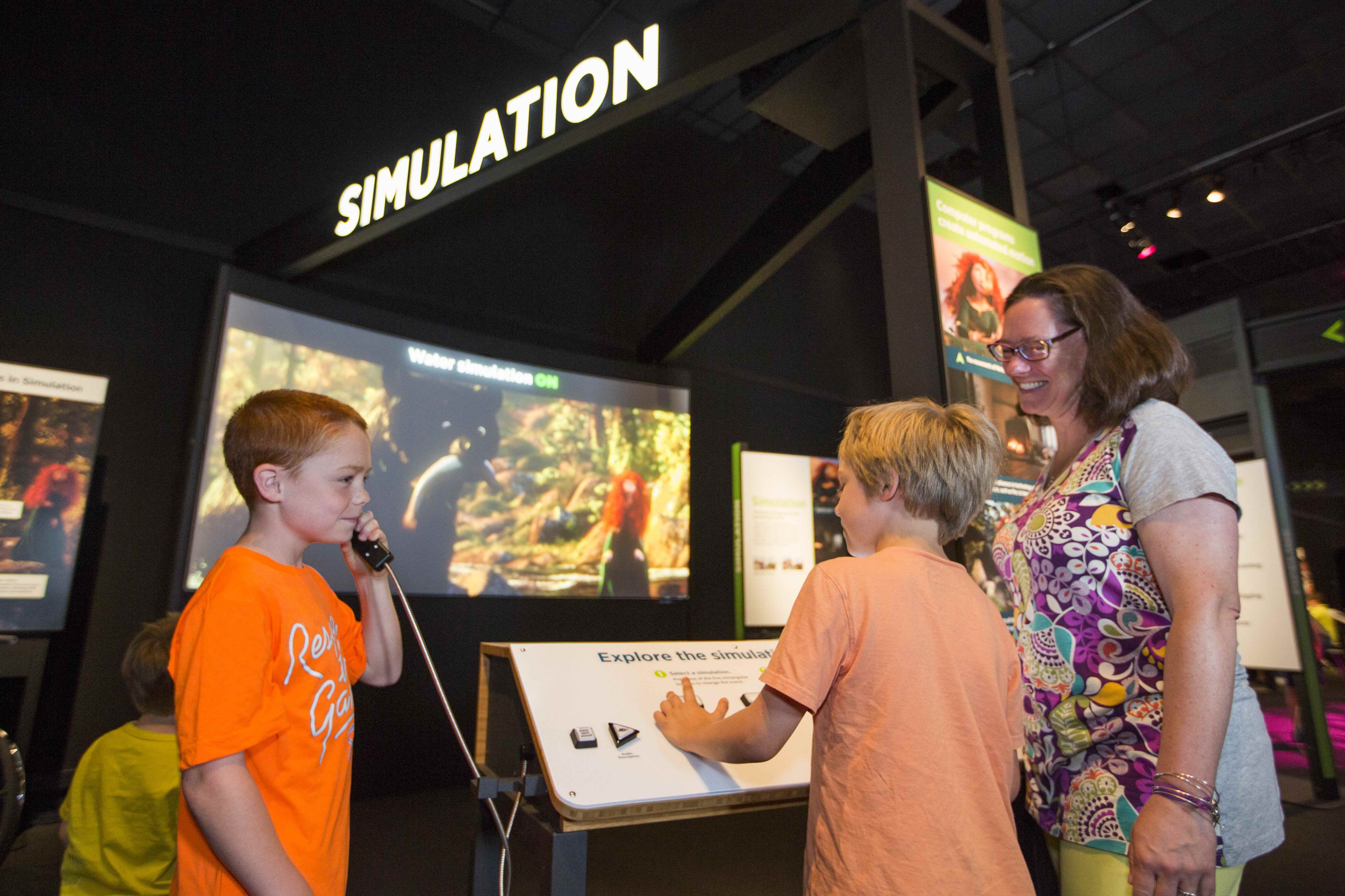 Children playing with Pixar simulation