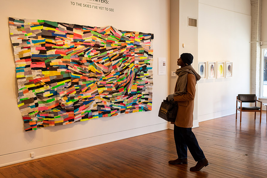 Image of patron at a local art gallery