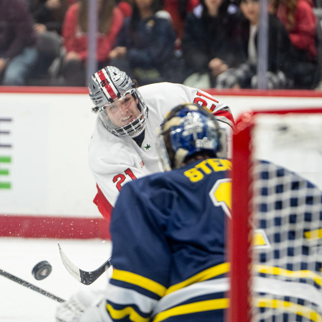 Image of Ohio State men's hockey player shooting.