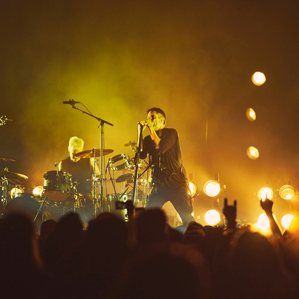 Image of Nine Inch Nails performing.