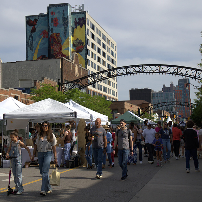 Crowd and vendors at May Hops on High in the Short North Arts District.