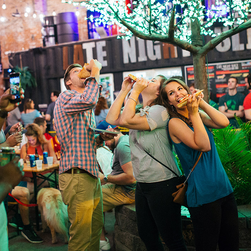 Image of people eating pizza.
