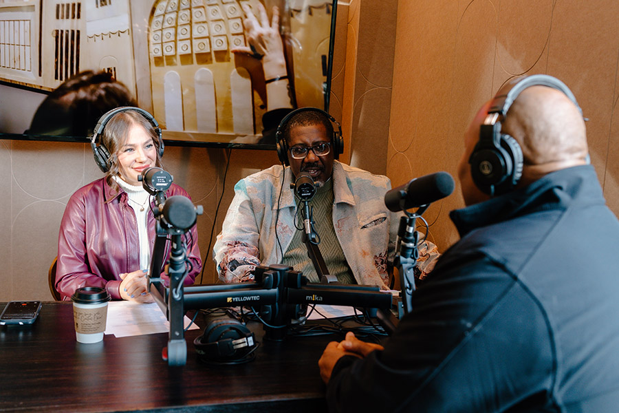 Image of podcast interviewer and interviewees.