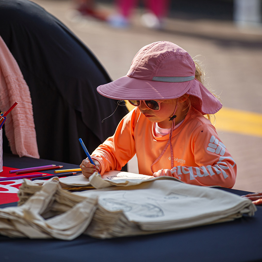 Image of a child at an activity station.