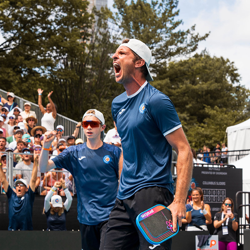 Image of two pickleball players.