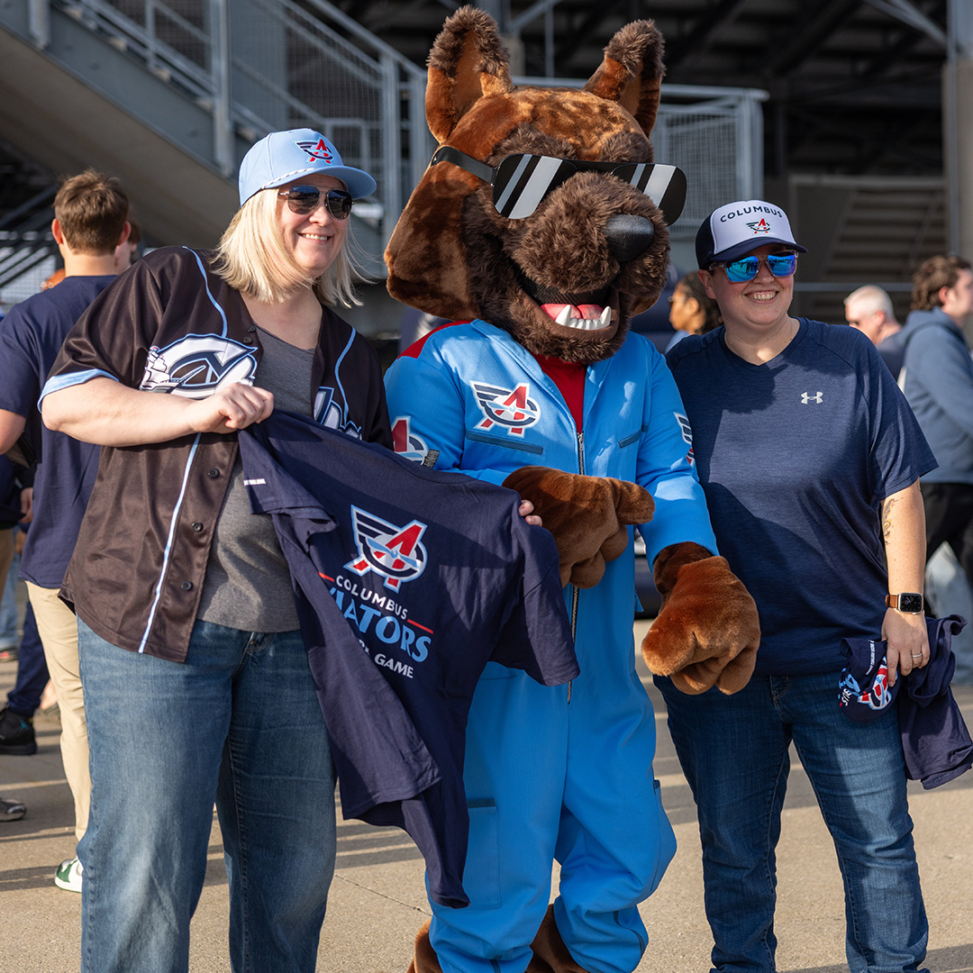 Image of Columbus Aviators fans and the mascot.