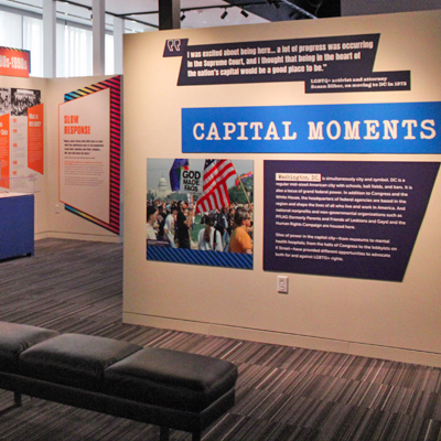 Gallery photo featuring the Capital Moments section and the related images, objects and wall text.