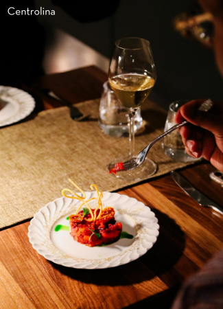 A guest enjoys beef tartare topped with crispy garnish at Centrolina in Washington, DC.        Ask ChatGPT