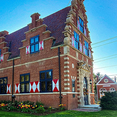 Exterior view of the Zwaanendael Museum in Lewes, Delaware, a distinctive Dutch-style building with a steeped gable façade, reflecting the area’s early European settlement history.