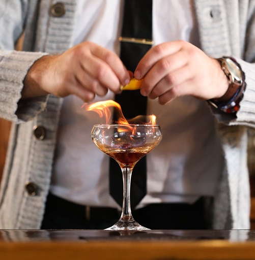 wiseguy lounge_cocktail with fire_fall sweater