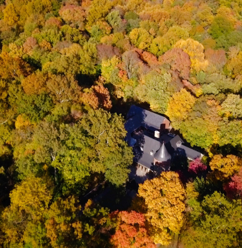 Audubon Museum surrounded by fall foliage