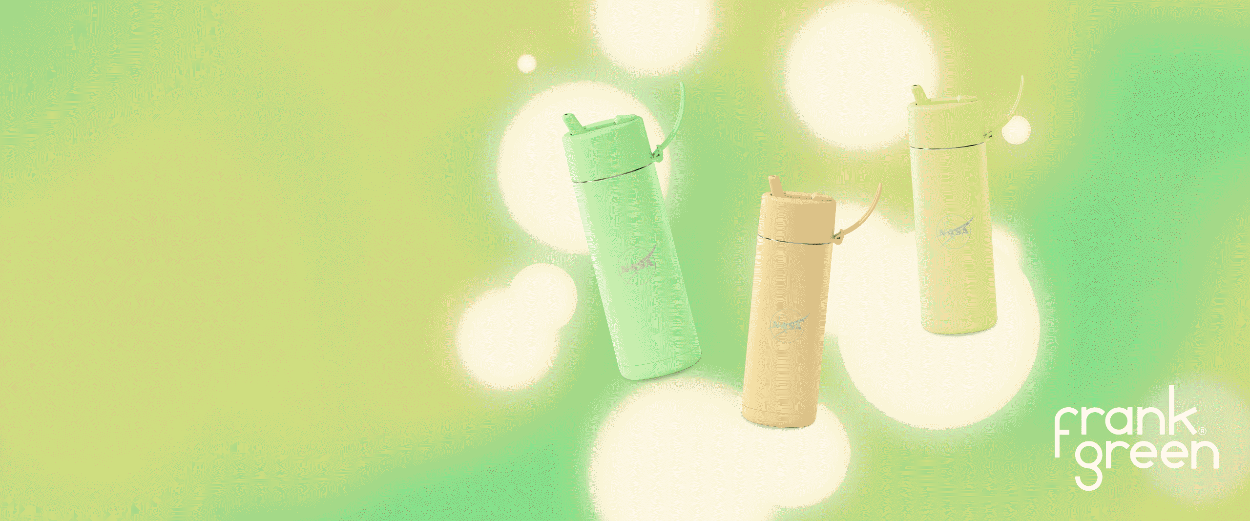 two green and beige water bottles