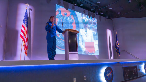 a man standing on a podium