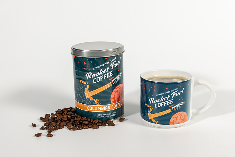 a coffee mug and a can of coffee