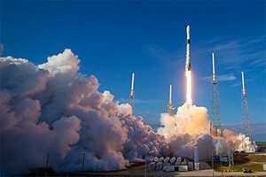 a rocket launching with smoke and clouds
