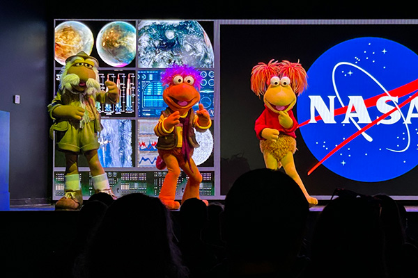 a group of puppets on a stage