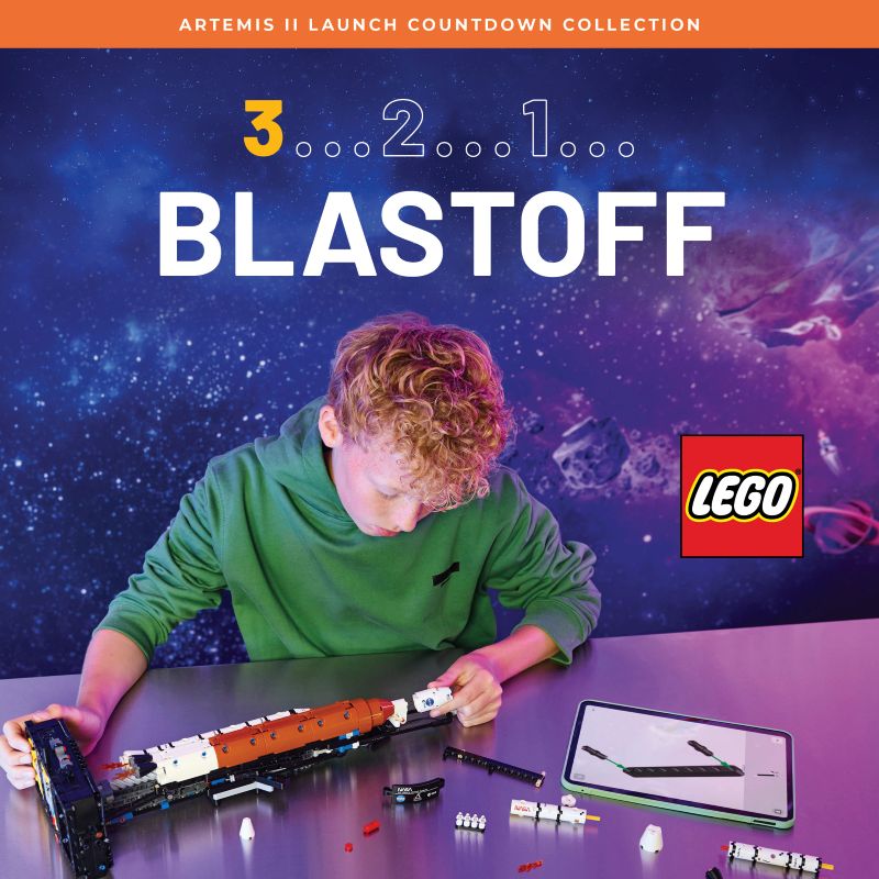 a boy playing with a toy rocket