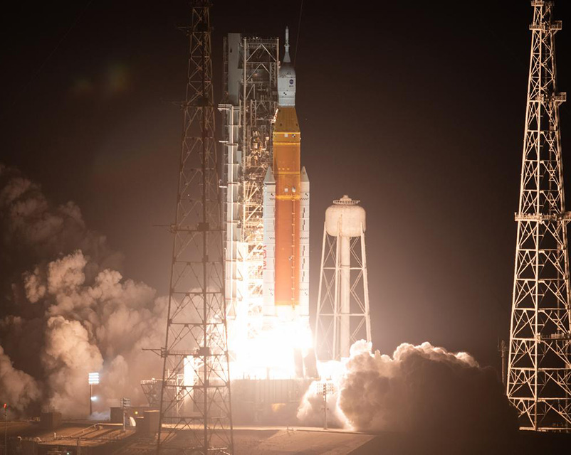 a rocket launching at night