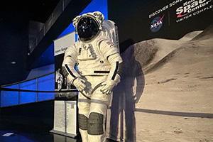 a astronaut suit in a museum
