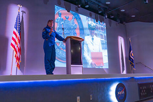 a man standing on a podium