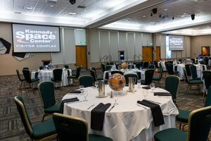 a room with tables and chairs