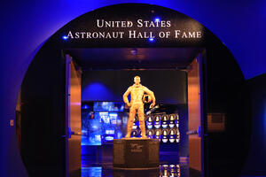a statue of a man in a space suit