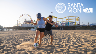 Two People Playing Soccer in the Beaches of Santa Monica