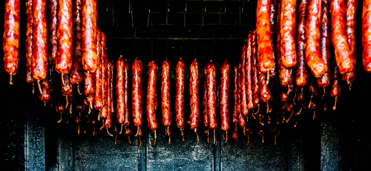 A close up shot of andouille sausage. 