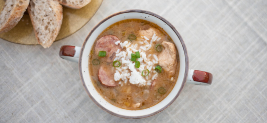 A bowl of chicken and sausage gumbo.