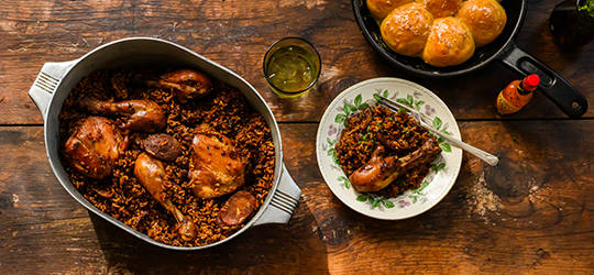 A pot of chicken and jambalaya.