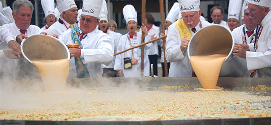 Dozens of chefs make a giant omelette at Abbeville's Giant Omelette Festival.
