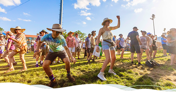 Festival attendees dance at Jazz Fest.