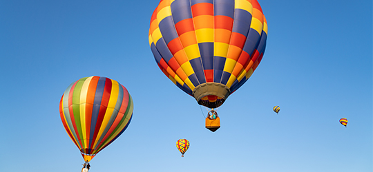 Hot air balloons lift off at a rally in Shreveport.