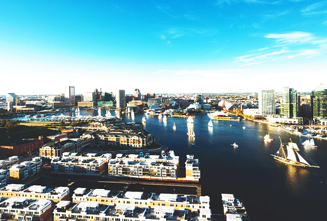 Picture of boats sailing in and out of the Baltimore Inner Harbor.