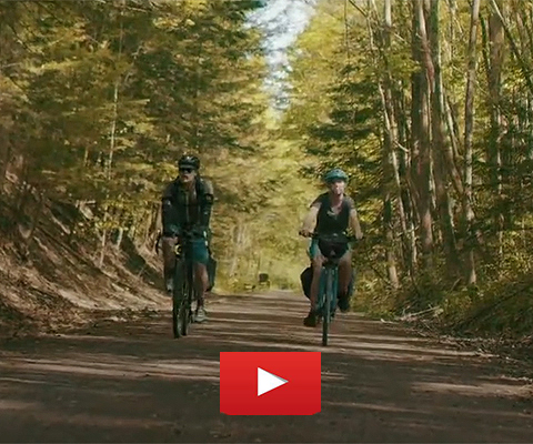 A picture of a couple riding their bikes together on the Cumberland Trail.
