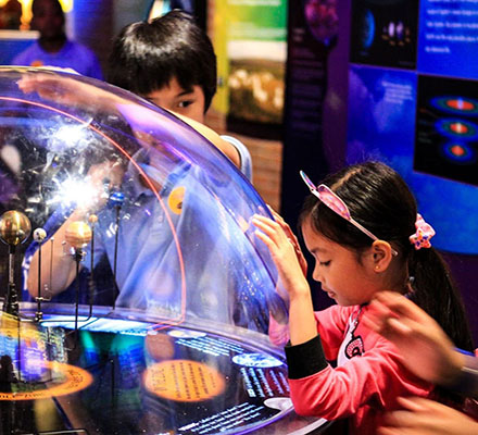 Picture of children enjoying the Maryland Science Center.