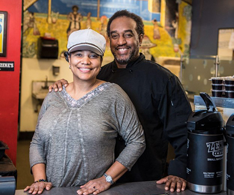 Picture of a couple at the Land of Kush vegan soul food restaurant.
