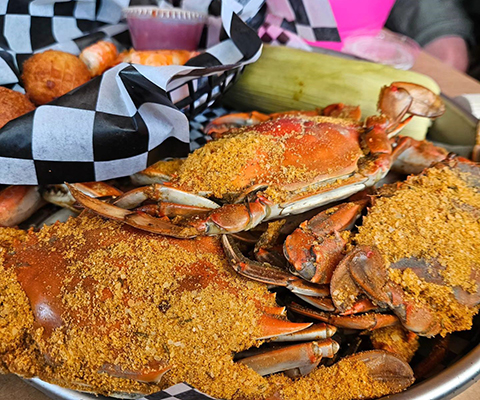 A picture a tray of steamed crabs from Ocean City.
